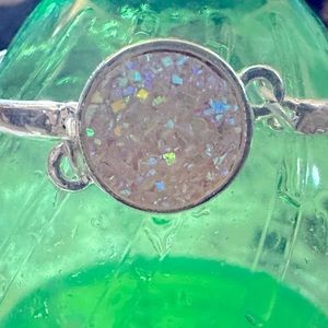 i’m selling three bracelets and opal, turquoise and blue one